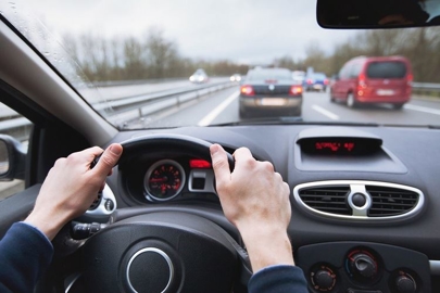 a person driving a car
