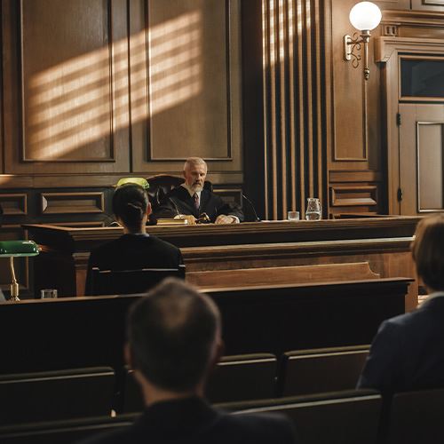 a man sitting in a courtroom