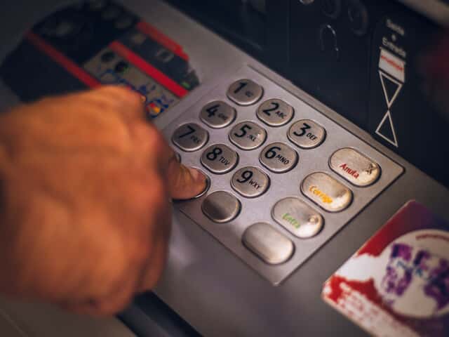 a person using a pin pad
