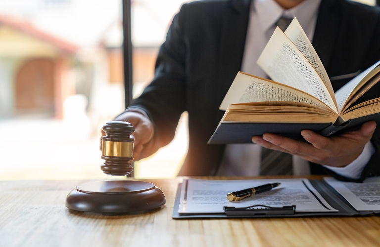 Lawyer is reading law book